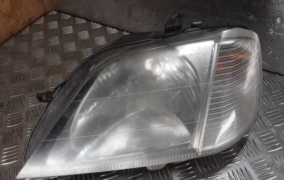 Dacia Logan I Headlight/headlamp 085511153L