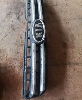 KIA Sportage Front bumper upper radiator grill 863501F030