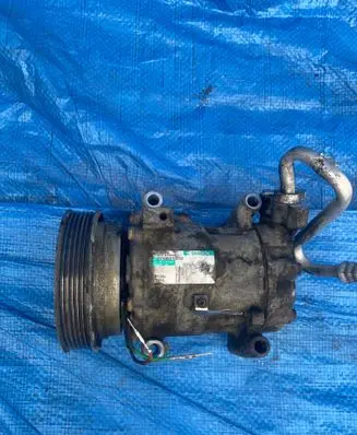 Nissan Juke I F15 Air conditioning (A/C) compressor (pump) 92600AZ74A