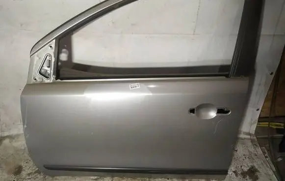 Nissan Note (E11) Front door pilkos