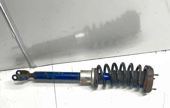 Front shock absorber with coil spring