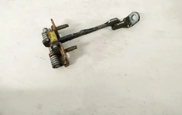Front door check strap stopper