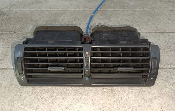 Dash center air vent grill