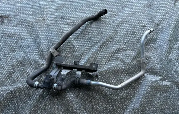 Volkswagen Touareg II Engine coolant pipe/hose 7P0815249 7P0815984 7P0819329B