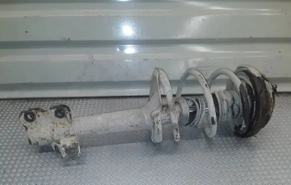Nissan X-Trail T30 Front shock absorber with coil spring 