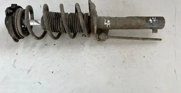 Volkswagen Touran I Front shock absorber/damper 1K0412331C