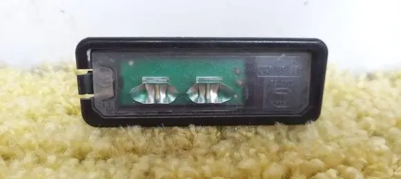 Volkswagen PASSAT B7 Number plate light 1K8943021C