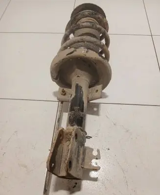 Renault Master III Front shock absorber with coil spring 335835
