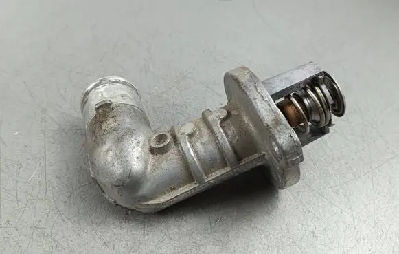 Thermostat/thermostat housing