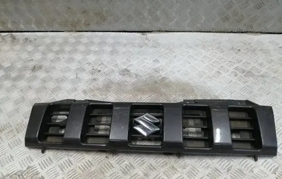 Suzuki Jimny Front bumper upper radiator grill 7211157M0