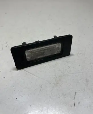 Skoda Fabia Mk2 (5J) Number plate light 8T0943021