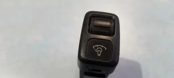 Panel lighting control switch