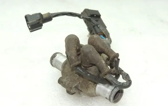 Suzuki Grand Vitara II Coolant heater 7492184A00 3685267JC1
