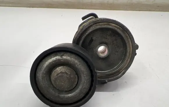 Generator/alternator belt tensioner