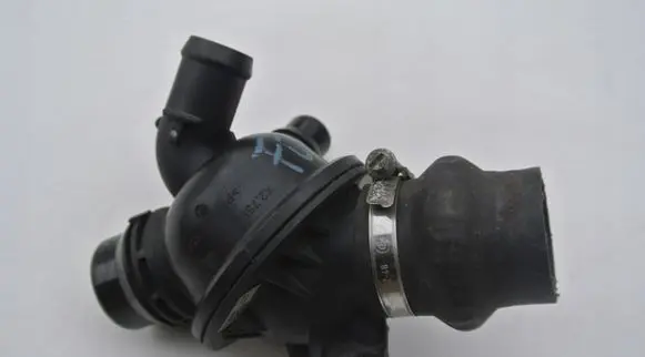 Thermostat/thermostat housing