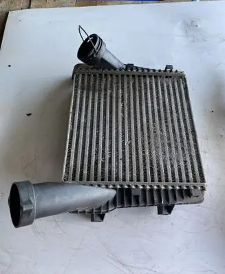 Volkswagen Touareg I Intercooler radiator 7L6145803C