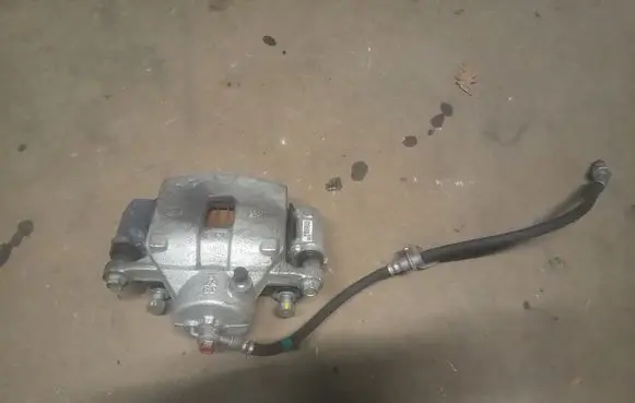 Hyundai Kona I Front brake caliper