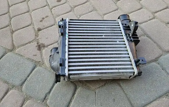 Opel Astra L Intercooler radiator 9675627980