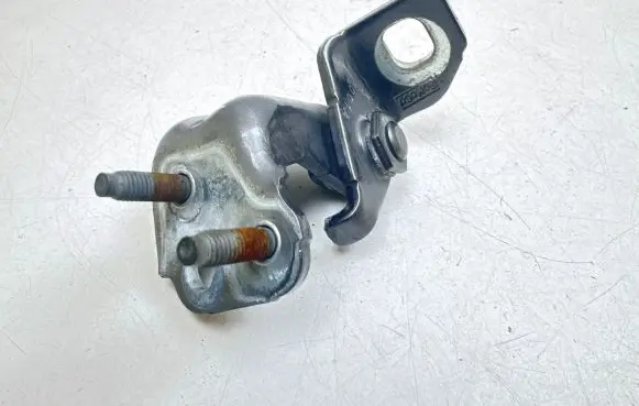 Rear door upper hinge