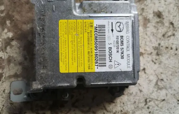 Mazda 3 II Airbag control unit/module BCM557K30