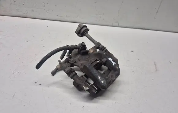 Opel Astra J Rear brake caliper 13407125