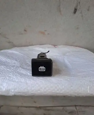 KIA Carens I Windscreen/window heater switch