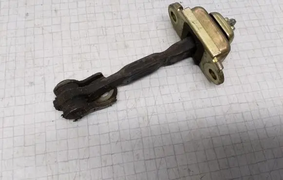 Nissan Almera N16 Rear door check strap stopper