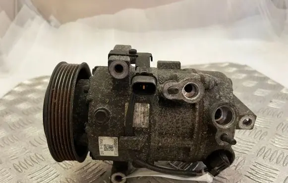 KIA Sportage Air conditioning (A/C) compressor (pump) 97701D7000