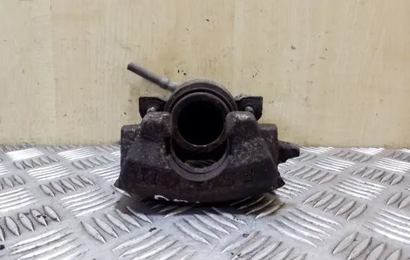 Volkswagen Golf VI Front brake caliper