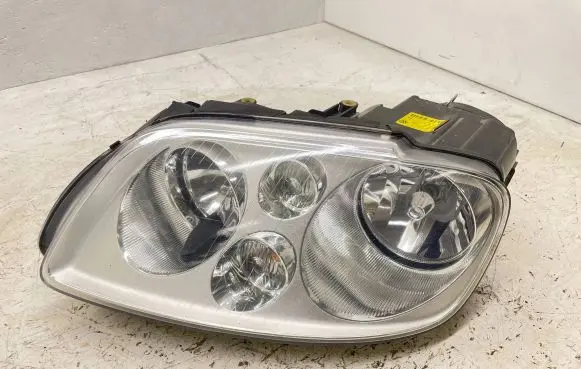 Volkswagen Touran I Headlight/headlamp 1T0941005D