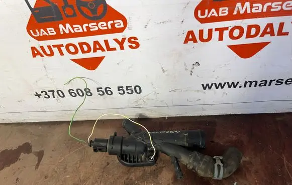 Volkswagen Jetta VI Thermostat/thermostat housing 03L121131AA