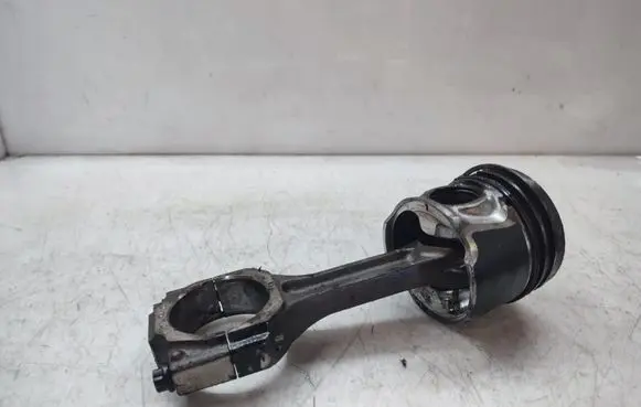 Piston with connecting rod