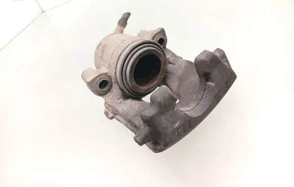 Volkswagen Golf VI Front brake caliper 