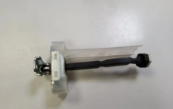 Toyota C-HR I Rear door check strap stopper 68630F4010