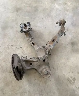 Rear wheel hub spindle/knuckle