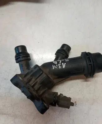 Thermostat/thermostat housing