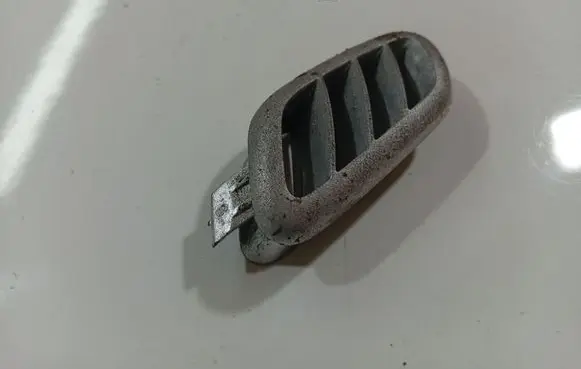 Dash center air vent grill