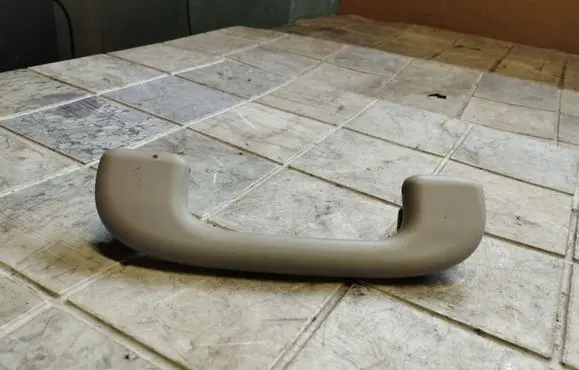Front interior roof grab handle