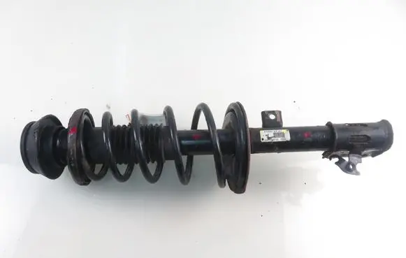 Suzuki Swift I Front shock absorber with coil spring 4160263J61