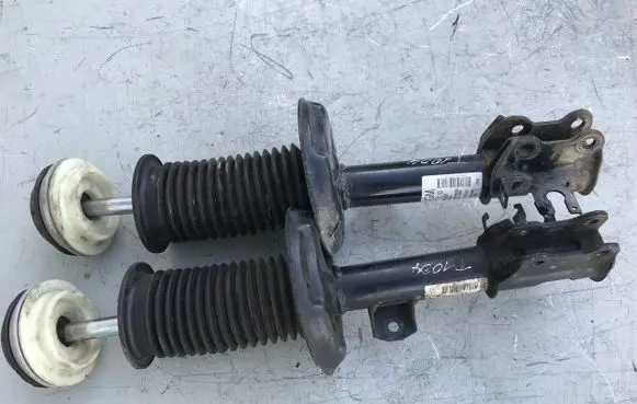 Opel Corsa D Front shock absorber/damper 13343097 13343100
