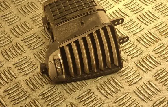 KIA Sorento Dash center air vent grill 974303E500