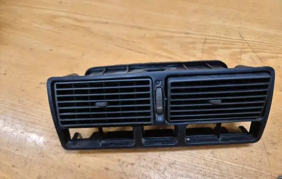 Volkswagen Golf IV Dash center air vent grill 1J0819734 1355D3353