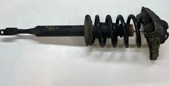 Front shock absorber with coil spring