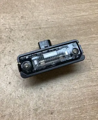Volkswagen New Beetle Number plate light 1C0943021