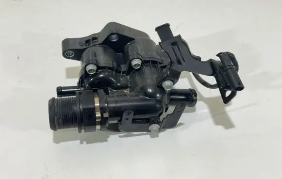 Thermostat/thermostat housing