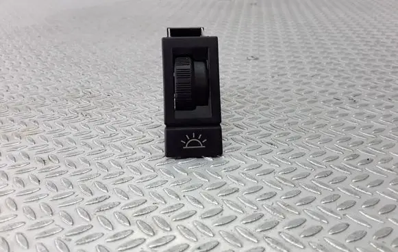 Panel lighting control switch