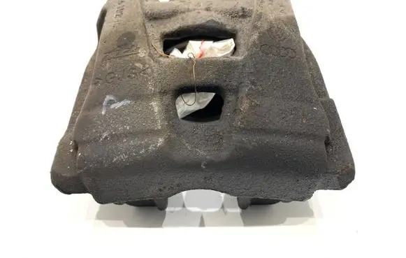 Volkswagen PASSAT B7 Front brake caliper 