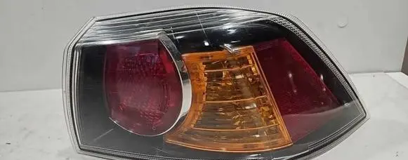 Mitsubishi Lancer VIII Rear/tail lights P5613