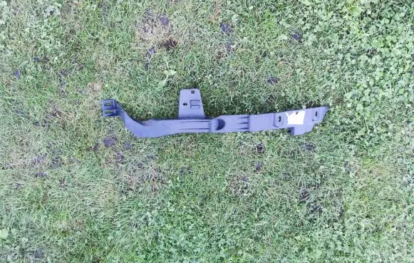 Opel Astra J Headlight/headlamp mounting bracket 13287639