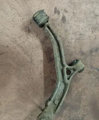 Chrysler Voyager Front lower control arm/wishbone 04694973AB